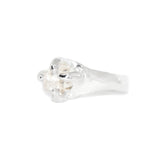 Silver ring with a diamond on a white background