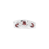 Silver ring with red gemstones