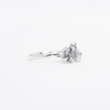 Silver ring toi et moi design with gemstone on a white background