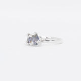 Silver ring toi et moi design with gemstone on a white background