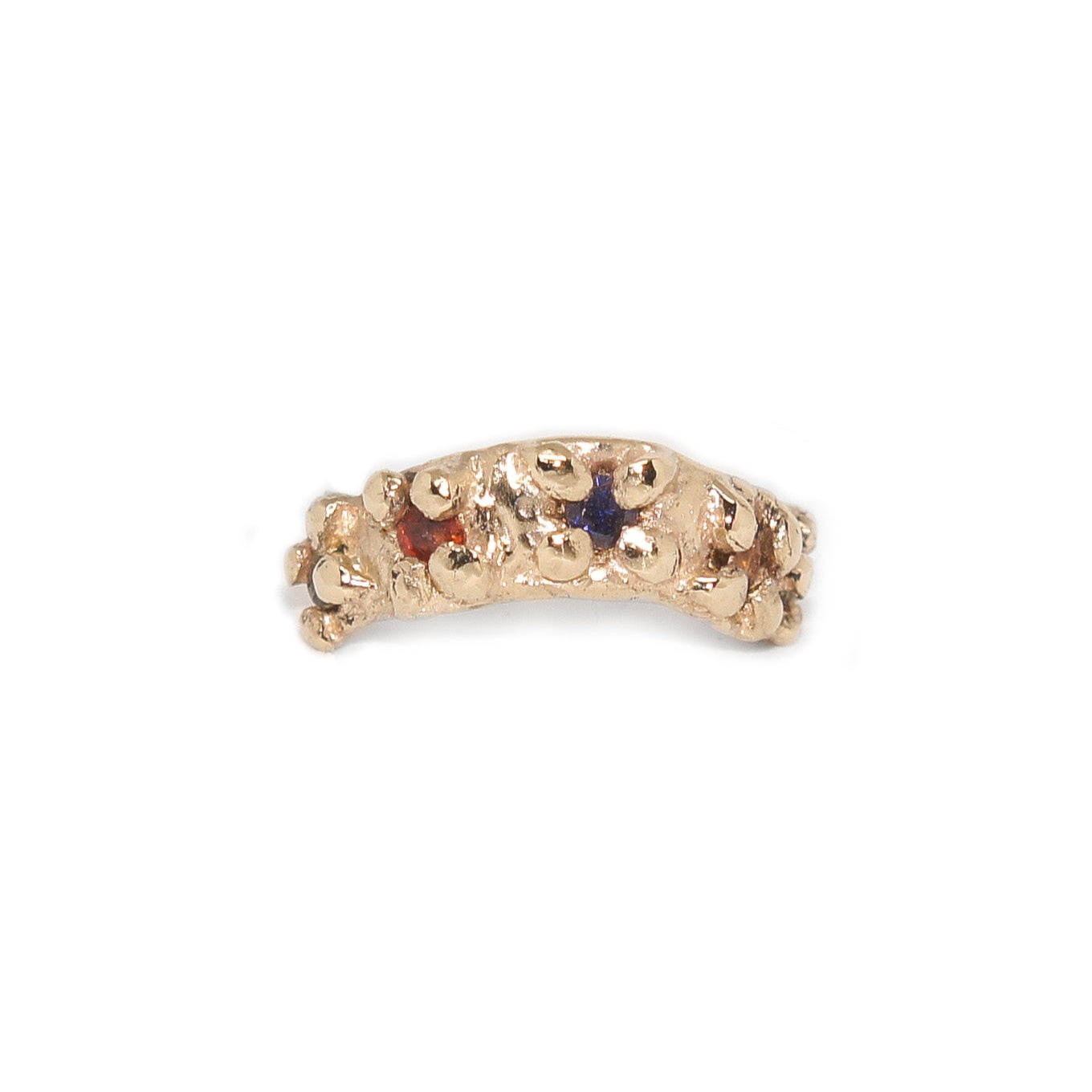 Gold ring with multi coloured sapphires on a white background