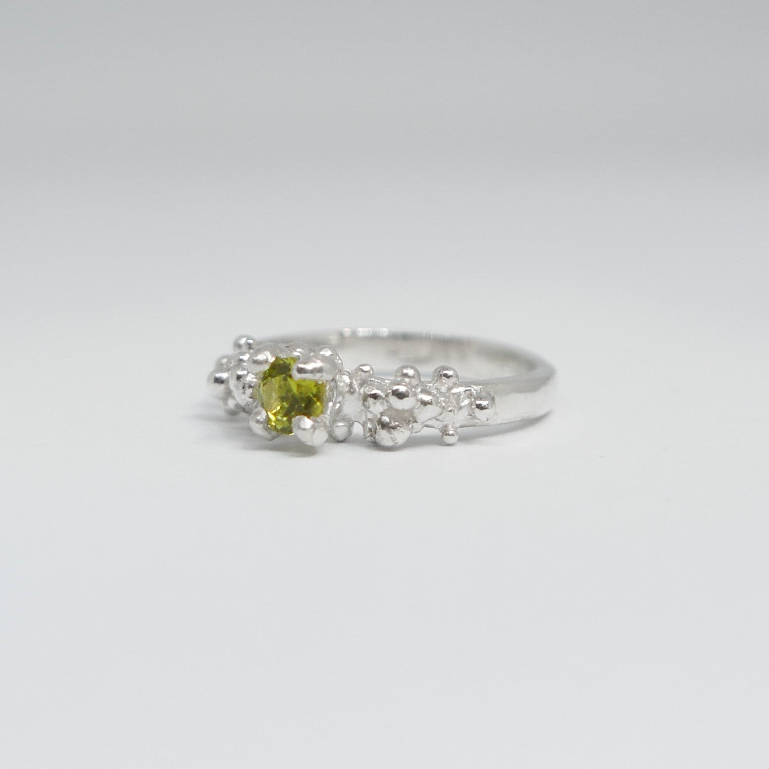 Lime Green Gemstone in Silver Ring