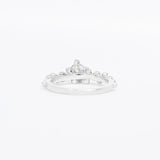 Silver ring with small diamonds on a white background