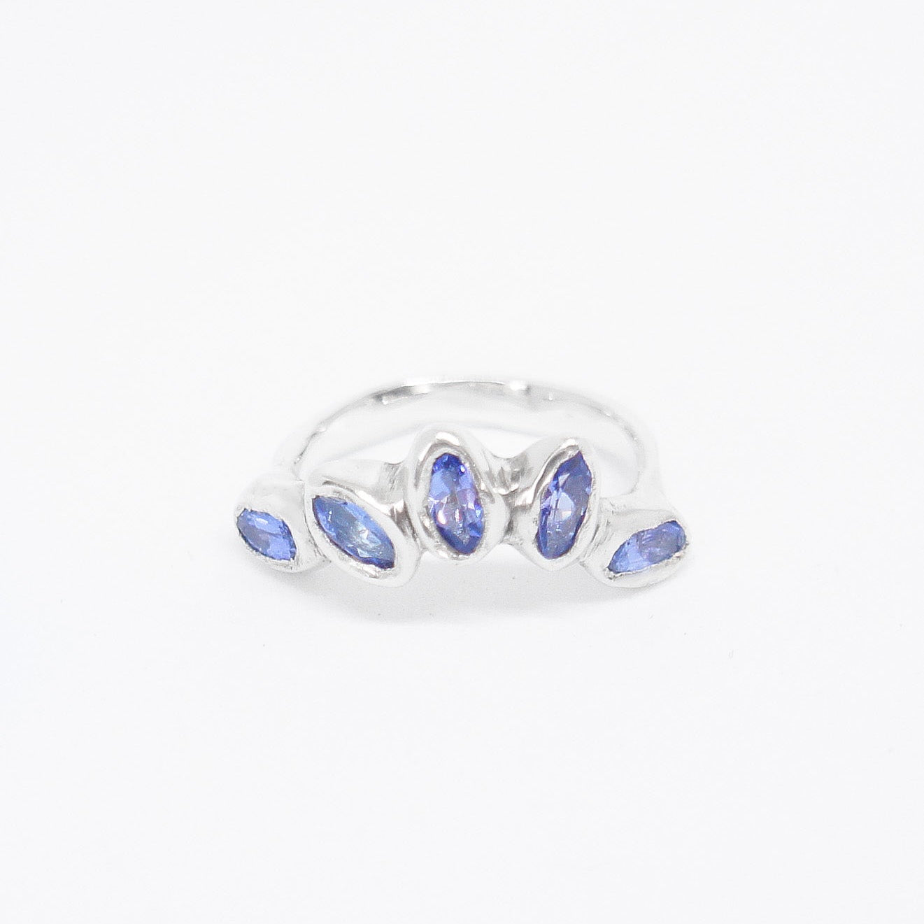 Silverring with blue stones on a white background