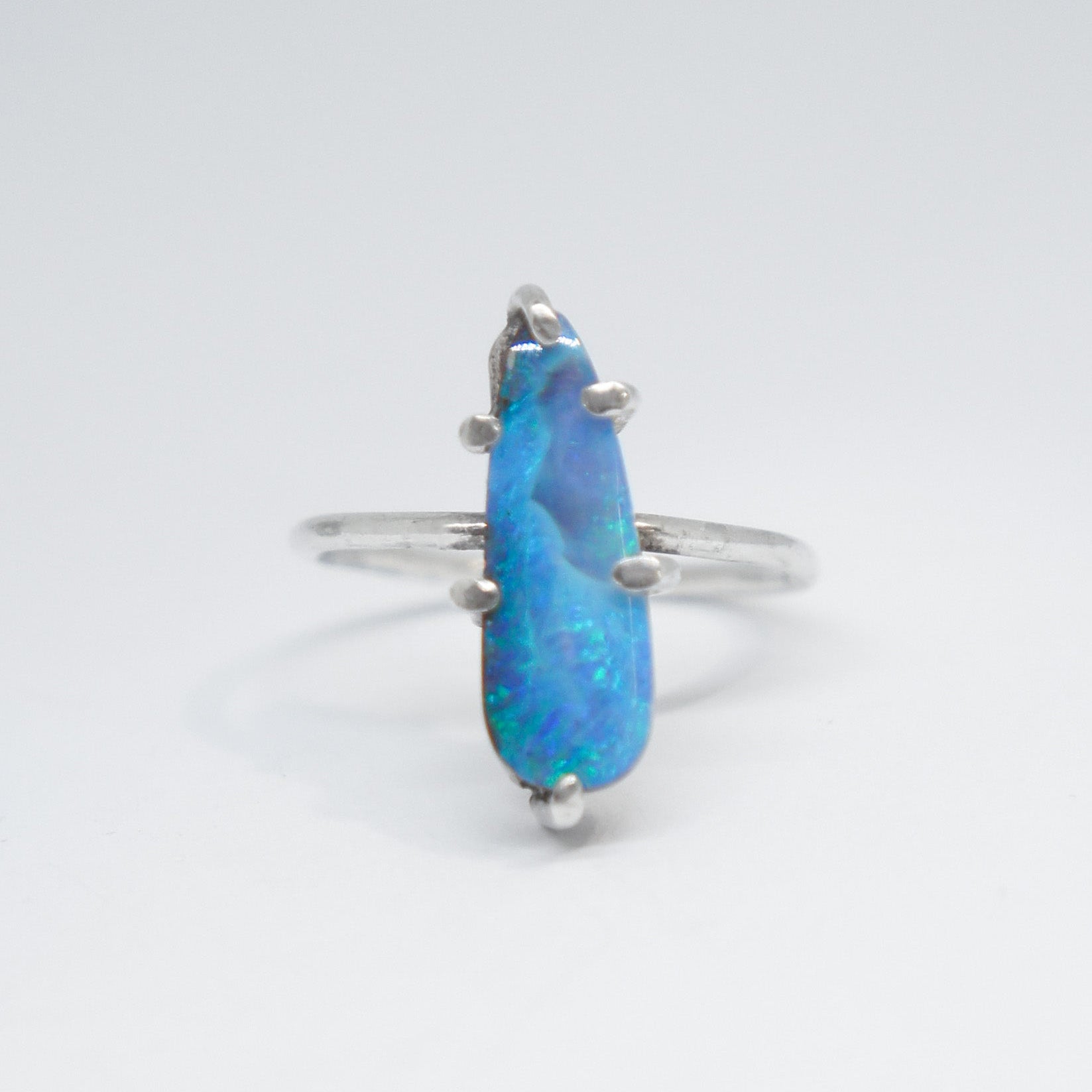 Solid Opal in 6 claw set silver ring