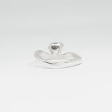 Silver ring on a white background